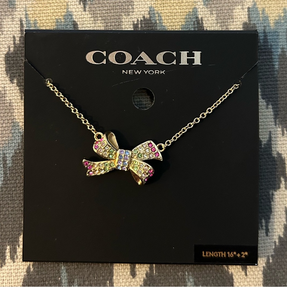 NWT Coach Rainbow Bow Necklace with pave crystals in a rainbow of colors!